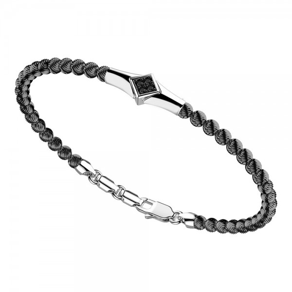 silver  bracelet and black spinels.