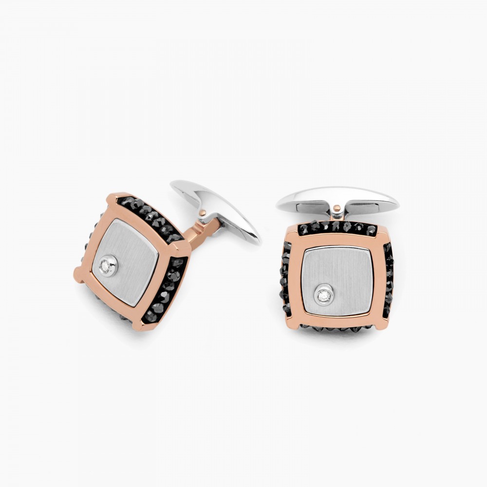 Gemelli in oro quadrati.