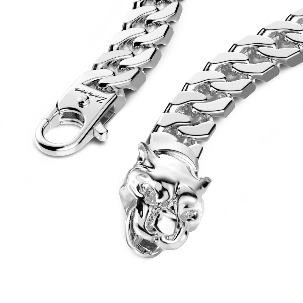 Zancan silver curb chain bracelet with panther head closure.