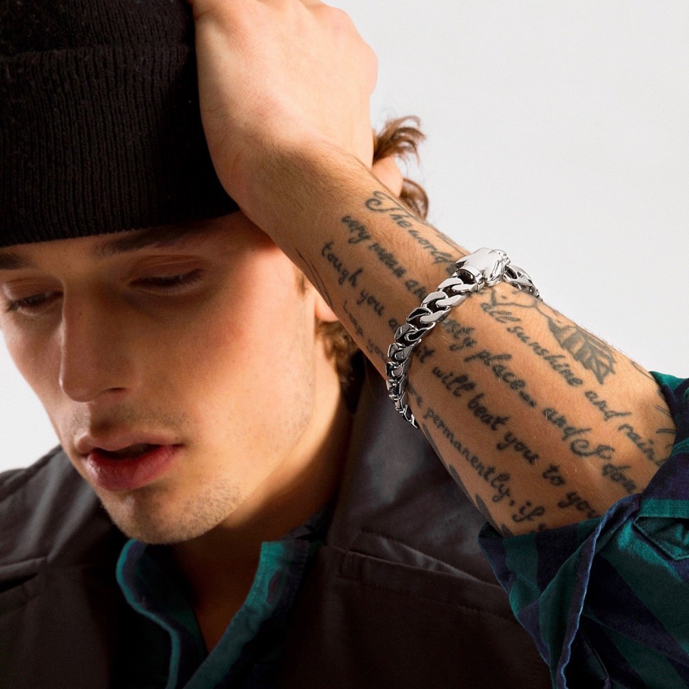 Zancan silver curb chain bracelet with panther head closure.