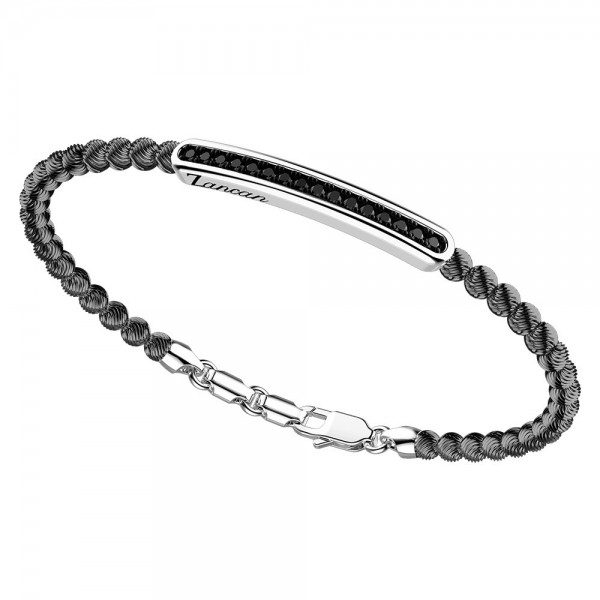 Bracciale in argento con sfere striate e pietre nere.